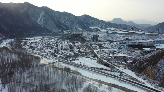 4K航拍北方农村雪景视频