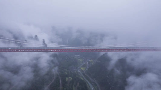 4K湖南矮寨大桥斜拉式基建云海航拍延时视频