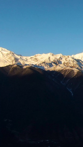 航拍梅里雪山清晨日照金山视频梅里雪山景区视频