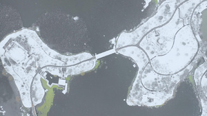 4K大雪天气航拍城市湖心岛自然风光视频素材30秒视频
