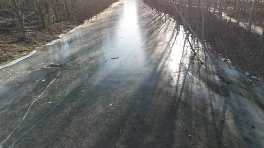 4K航拍阳光下结冰的河流 河北永定河视频