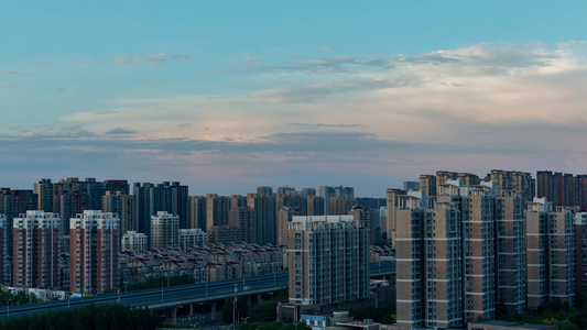 城市建筑天际线落日晚霞流云白天到夜晚灯光视频