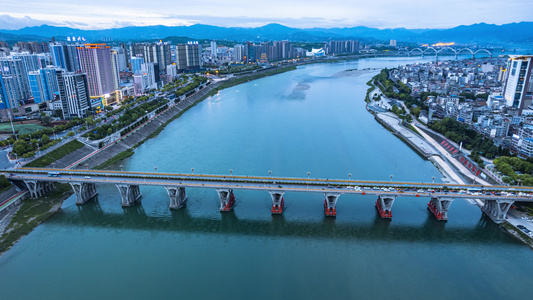 8K陕西安康汉江大桥城市沿岸风光航拍延时视频
