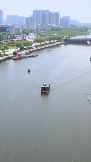 荆州古城4A景区运河护城河三国造型古船游船航拍古城运河120秒视频