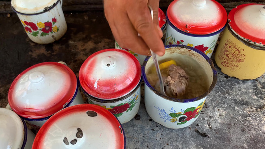 实拍新疆南部喀什地区著名美食小吃茶缸肉制作过程视频合集视频