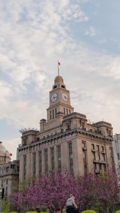 上海地标外滩海关大楼洋楼钟楼大范围移动延时过渡镜头视频