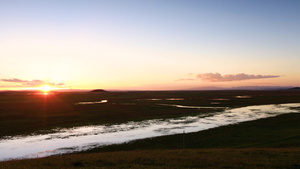 草原湿地美丽的日落延时视频14秒视频