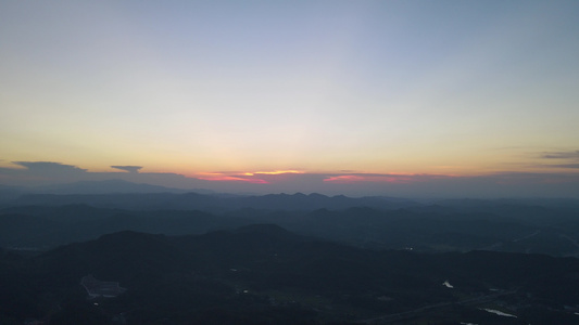 航拍夕阳下大自然山川河流森林视频