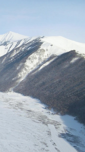 航拍冬天冰封雪山自然风光视频