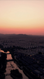 城市日落晚霞夕阳竖屏航拍视频