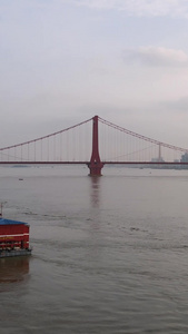 低空航拍风光城市长江江景桥梁道路立体交通天空晚霞城市素材城市建设视频
