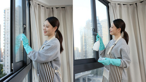 阳台清洁玻璃的居家女性21秒视频
