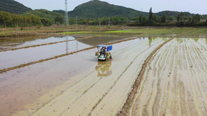 4K航拍春耕机械自动化播秧18秒视频