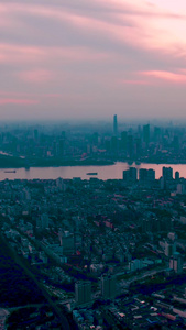 航拍晚霞之下的都市风光延时视频素材城市建设视频