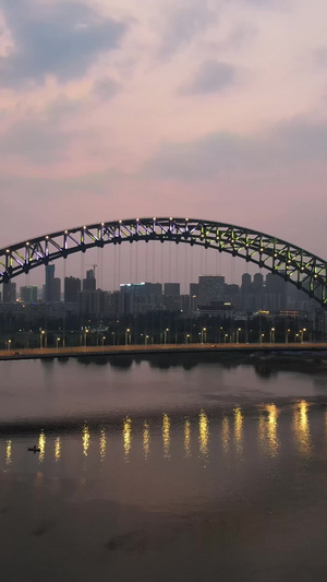 航拍城市夕阳晚霞天空落日湖北江汉湾大桥夜景车流素材夜景素材65秒视频