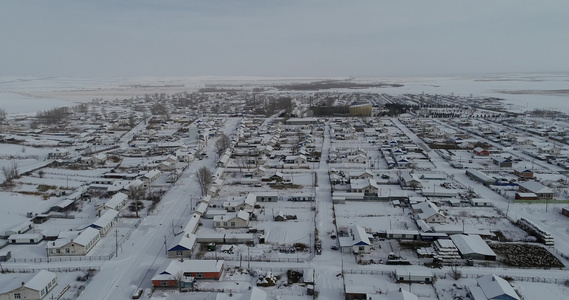 冬季雪天呼伦贝尔农垦农场乡村民居视频