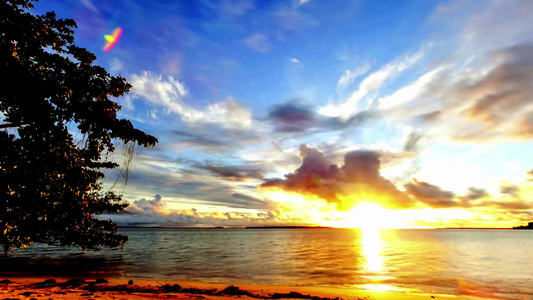  沙滩海岸航拍延时海边日落夕阳视频