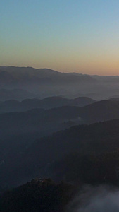 航拍清晨大山深处山谷云雾自然风光视频