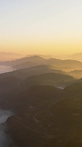 航拍清晨大山深处山谷云雾自然风光视频