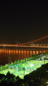 航拍城市江景夜景桥梁灯光足球场运动健身体育比赛场地素材运动素材视频