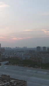 航拍城市风光落日晚霞夕阳天空素材城市建设视频