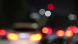 4K夜晚城市下班高峰期汽车灯晕多镜头组合实拍71秒视频