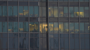 航拍城市办公楼夜景灯火通明的办公室加班工作4k素材72秒视频
