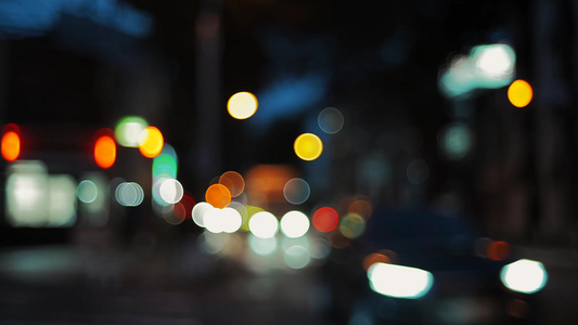 城市夜景车流路灯光斑霓虹灯光斑虚化视频