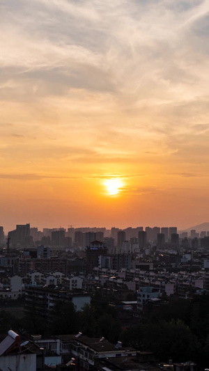 实拍晚霞夕阳落日城市天际线延时摄影14秒视频