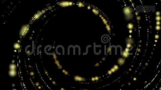 黑色背景下黄色圆形粒子在空间中的慢圆周运动视频