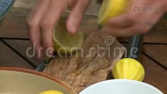 切割柠檬，榨汁成碗视频