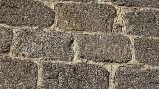 石墙的纹理.. 古堡石壁纹理背景.. 石墙的一部分视频