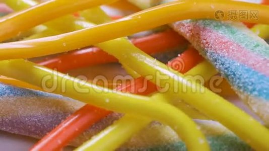 五颜六色的糖果、果冻、棒棒糖、混合甜香的概念作为背景视频