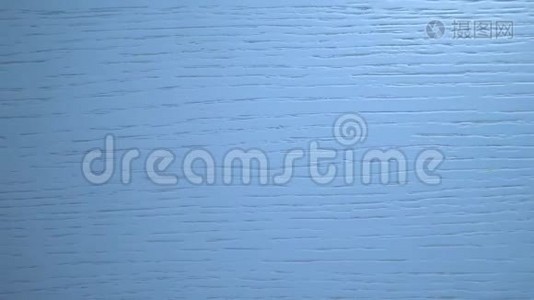 木蓝色纹理背景.. 蓝色板与自然纹理的时尚设计。 木材表面视频