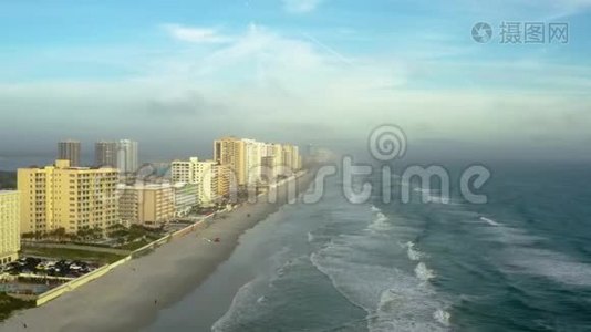 日出期间佛罗里达代托纳海滩的空中4k镜头视频
