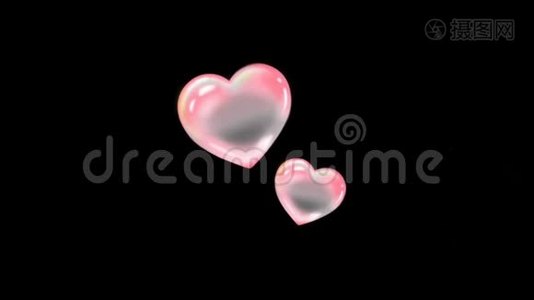 动画粉红红心形状在黑色背景。视频