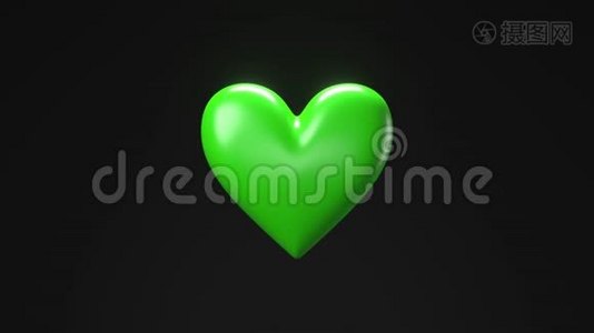 绿色破碎的心脏物体在黑色的背景。 心形物体粉碎成碎片。视频