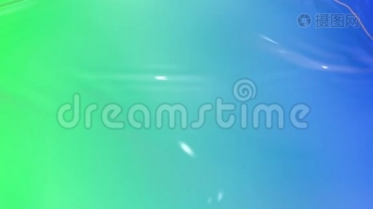 动画绿色蓝色液体梯度的油漆作为背景在4k。 3D波浪布表面形成波纹，就像液体一样视频