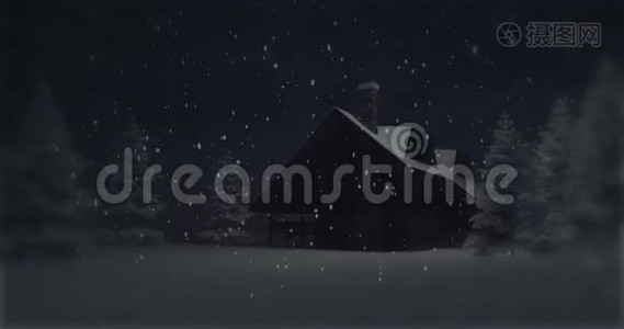 夜晚降雪时，在一片雪林中点亮的小屋视频