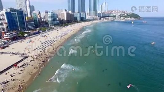 阳光明媚的夏季海恩大海滩，釜山，韩国，亚洲视频