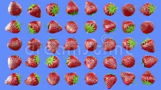 新鲜草莓在绿色屏幕上旋转。 水果背景。视频