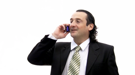 商人用电话说话。视频