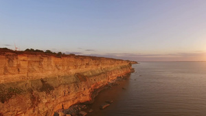 日落时的海边悬崖10秒视频