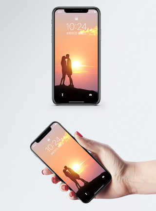夕阳下的情侣剪影手机壁纸图片