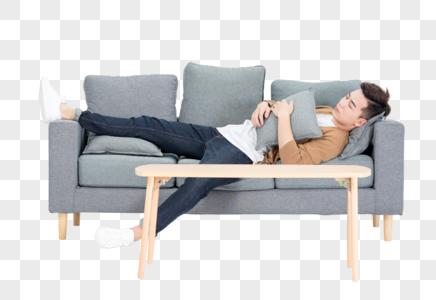 躺在沙发上休息睡觉的青年男性图片
