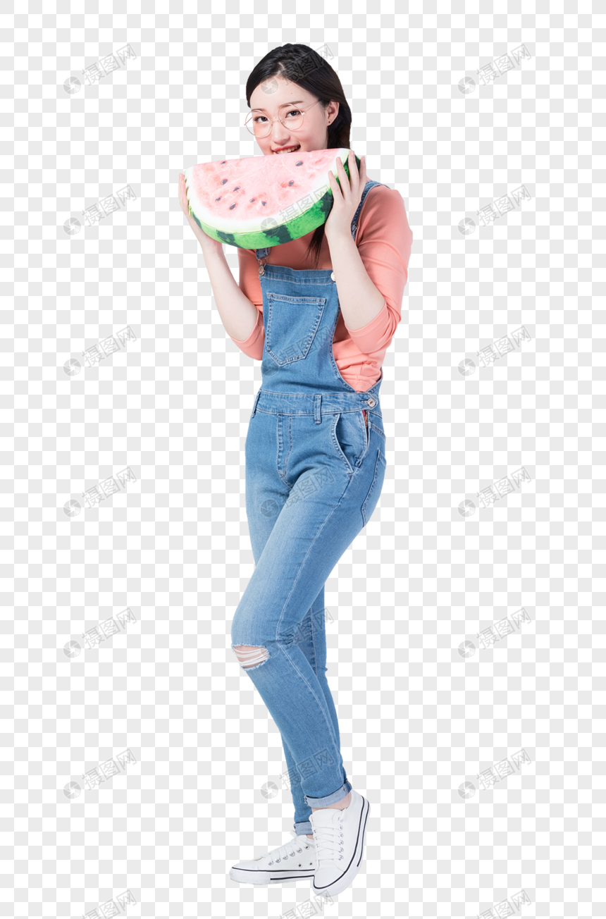 年轻甜美美女手拿西瓜抱枕图片