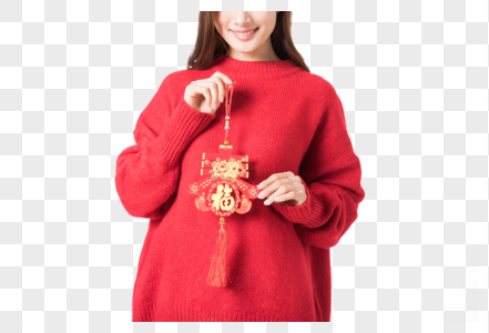 新年女性拿红色中国结图片图片
