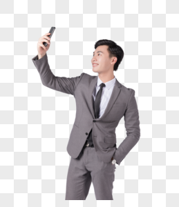 商务男士用手机拍照图片图片