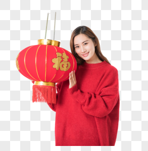 提着红灯笼的年轻女性图片