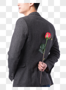 手拿玫瑰花的男性背影图片素材